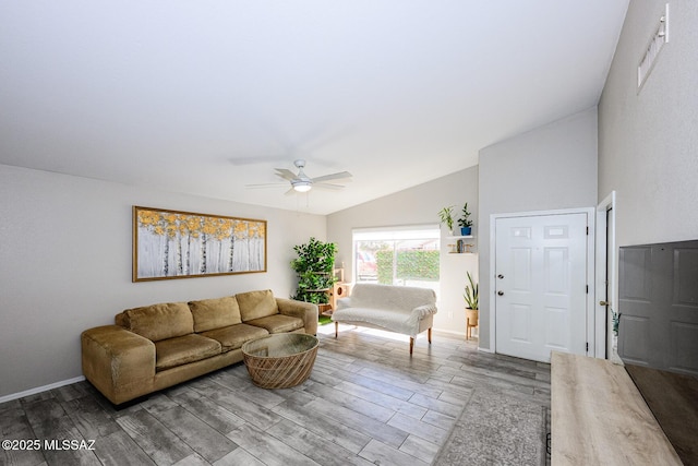 2943 N Gold Creek Pl, Tucson, AZ 85745 - living area with lofted ceiling, ceiling fan, wood finished floors, and baseboards