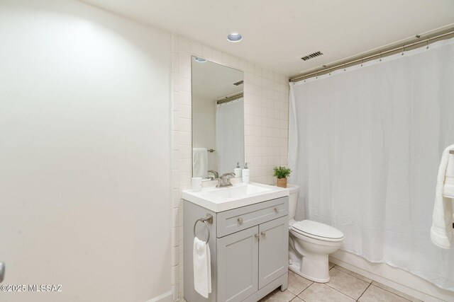 1600 N Wilmot Rd Unit 155, Tucson, AZ 85712 - full bath featuring tile patterned flooring, toilet, vanity, and a shower with shower curtain