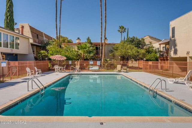 1600 N Wilmot Rd Unit 155, Tucson, AZ 85712 - community pool with a patio and fence