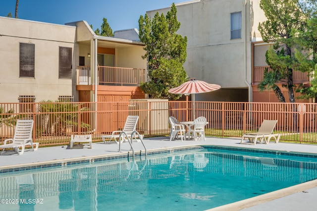 1600 N Wilmot Rd Unit 155, Tucson, AZ 85712 - community pool featuring fence and a patio area