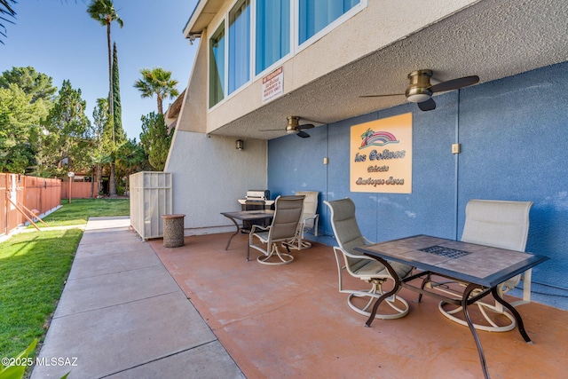 1600 N Wilmot Rd Unit 155, Tucson, AZ 85712 - view of patio with outdoor dining area and a ceiling fan