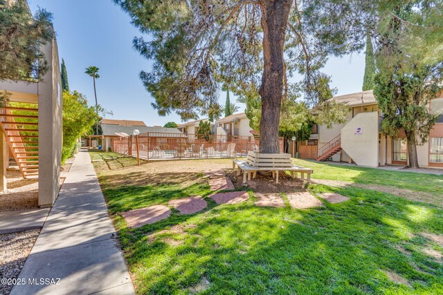 1600 N Wilmot Rd Unit 155, Tucson, AZ 85712 - view of yard featuring stairway