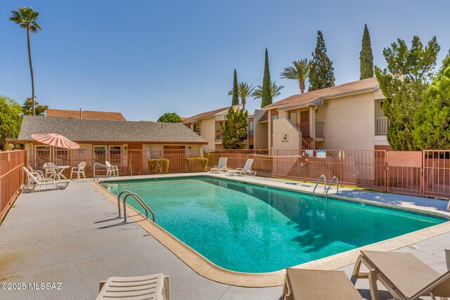 1600 N Wilmot Rd Unit 155, Tucson, AZ 85712 - community pool with fence and a patio