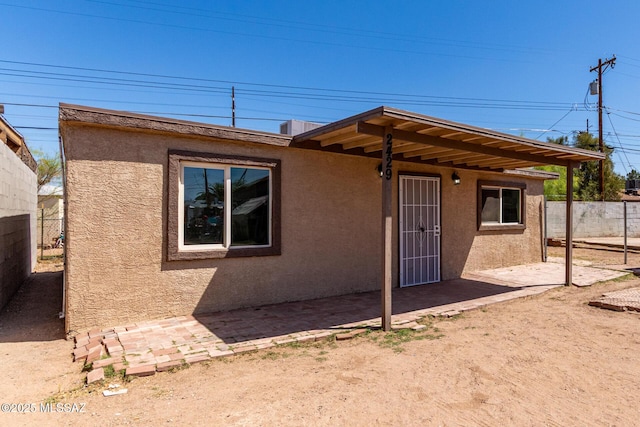 2429 E Cameron Vis, Tucson, AZ 85713 - view of front of house featuring stucco siding and a patio