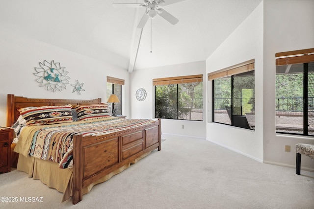 7133 E Grey Fox Ln, Tucson, AZ 85750 - bedroom featuring light colored carpet, lofted ceiling, multiple windows, and baseboards