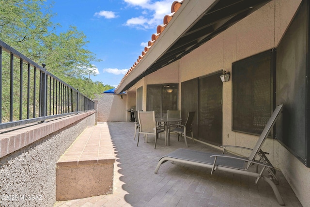 7133 E Grey Fox Ln, Tucson, AZ 85750 - fenced backyard with outdoor dining area and a patio