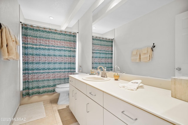 7133 E Grey Fox Ln, Tucson, AZ 85750 - bathroom with toilet, tile patterned floors, and vanity