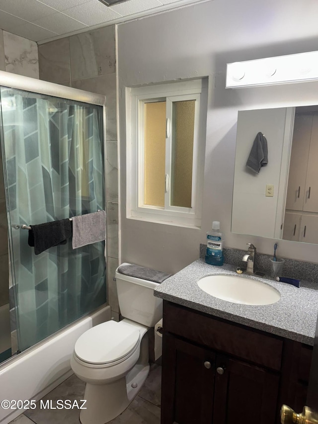 1002 S Kolb Rd Unit 2, Tucson, AZ 85710 - bathroom featuring vanity, toilet, and combined bath / shower with glass door