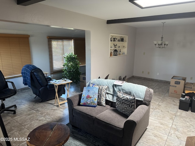 1002 S Kolb Rd Unit 2, Tucson, AZ 85710 - living room featuring a chandelier