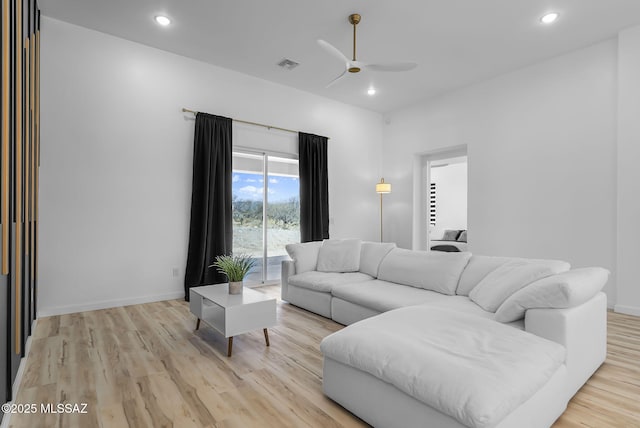 1803 Japon Ct, Rio Rico, AZ 85648 - living room featuring ceiling fan, light wood-style floors, recessed lighting, and baseboards