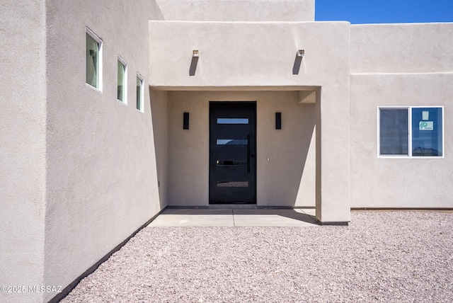 1803 Japon Ct, Rio Rico, AZ 85648 - view of exterior entry with stucco siding