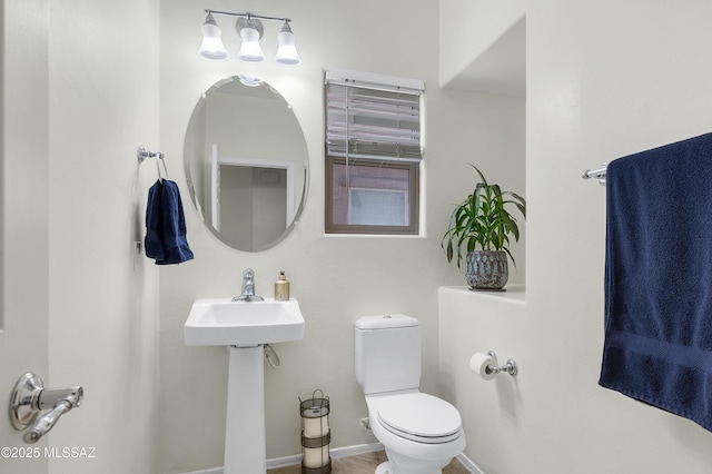 10583 E Forest Falls Ct, Tucson, AZ 85747 - bathroom with toilet and a sink