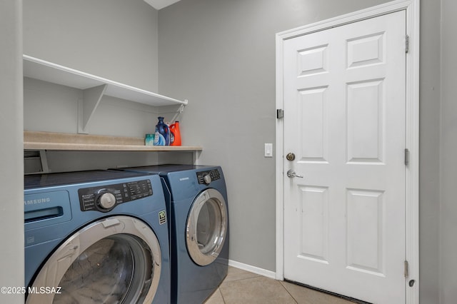 10583 E Forest Falls Ct, Tucson, AZ 85747 - laundry room with independent washer and dryer, light tile patterned flooring, and baseboards