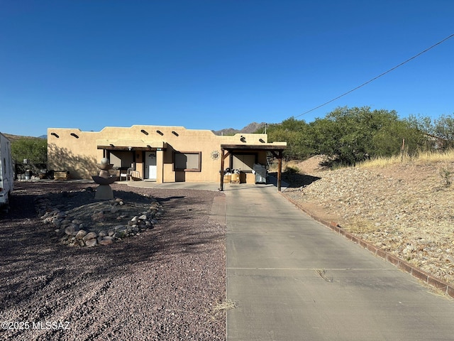 628 Via Cocospera, Rio Rico, AZ 85648 - view of front of home with stucco siding