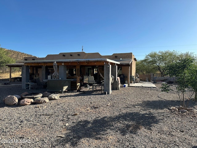 628 Via Cocospera, Rio Rico, AZ 85648 - rear view of property featuring a patio area