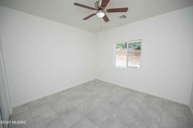 1681 Trampa Ct, Rio Rico, AZ 85648 - unfurnished room featuring ceiling fan and baseboards