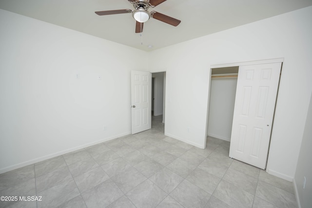 1681 Trampa Ct, Rio Rico, AZ 85648 - unfurnished bedroom featuring a closet, baseboards, and a ceiling fan
