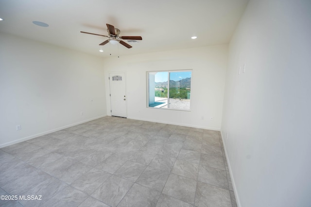 1681 Trampa Ct, Rio Rico, AZ 85648 - unfurnished room with a ceiling fan, recessed lighting, and baseboards