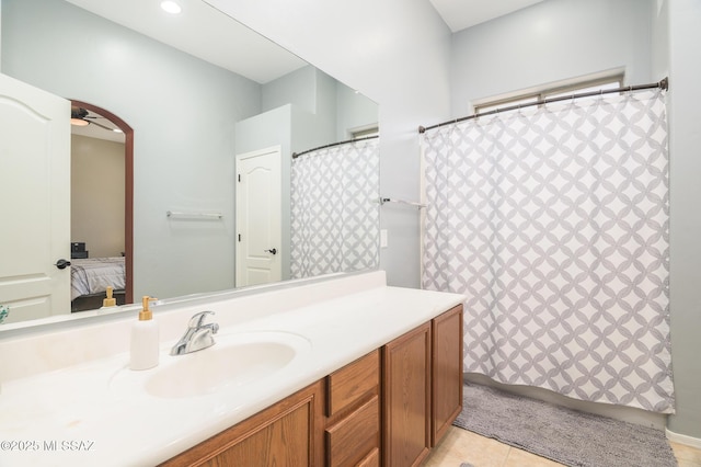 2511 N Avenida Tabica, Green Valley, AZ 85614 - ensuite bathroom with vanity and tile patterned floors