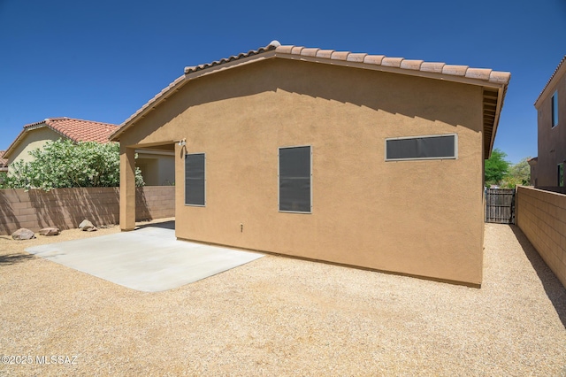 2511 N Avenida Tabica, Green Valley, AZ 85614 - rear view of property with a patio area, stucco siding, and a tile roof