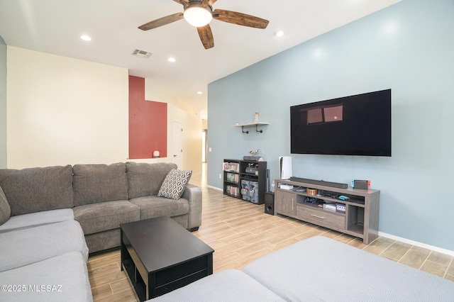 2511 N Avenida Tabica, Green Valley, AZ 85614 - living room with a ceiling fan, wood finish floors, recessed lighting, and baseboards