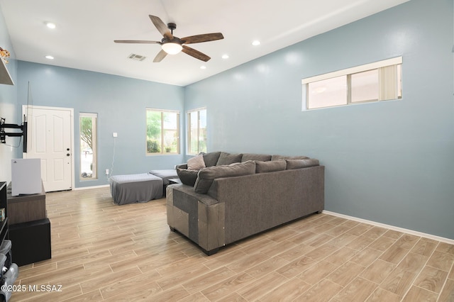 2511 N Avenida Tabica, Green Valley, AZ 85614 - living room featuring a ceiling fan, light wood-style floors, baseboards, and recessed lighting