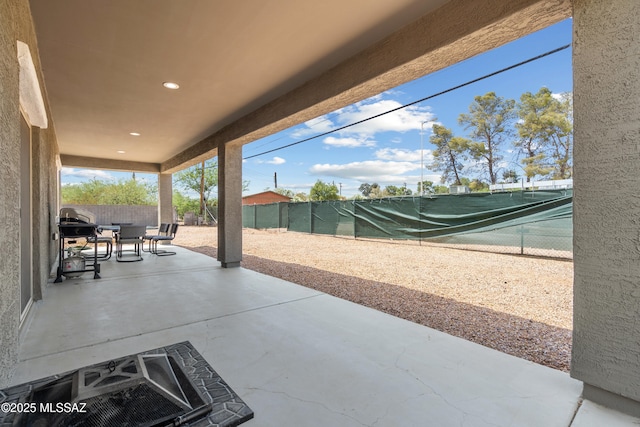 1941 E Greenlee Rd, Tucson, AZ 85719 - fenced backyard with a patio and area for grilling