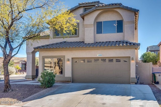 532 E Camino Luna Azul, Sahuarita, AZ 85629 - mediterranean / spanish-style home with a garage, concrete driveway, stucco siding, and a tile roof