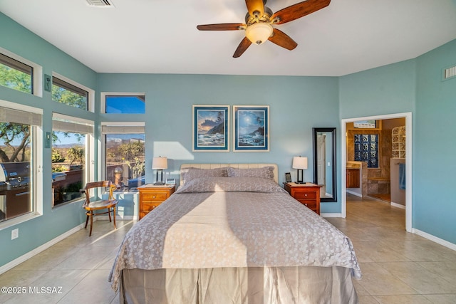 1861 E Crown Ridge Way, Oro Valley, AZ 85755 - bedroom featuring light tile patterned flooring, baseboards, and ceiling fan