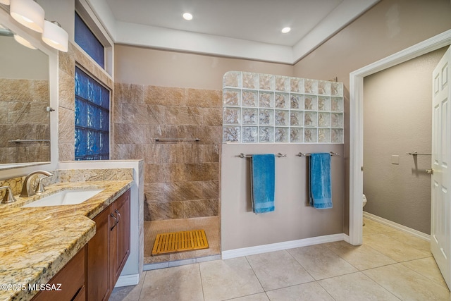 1861 E Crown Ridge Way, Oro Valley, AZ 85755 - bathroom with a walk in shower, vanity, tile patterned flooring, toilet, and recessed lighting
