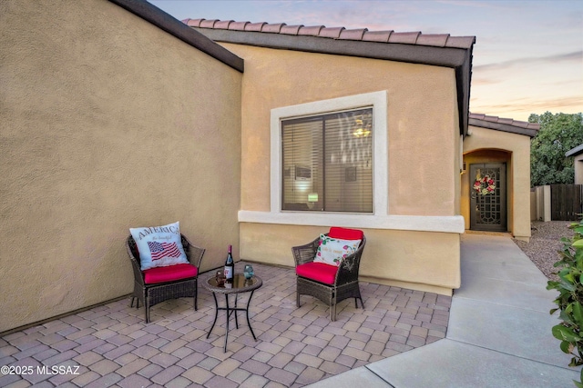 14511 S Camino Tierra Luna, Sahuarita, AZ 85629 - patio terrace at dusk featuring a patio area