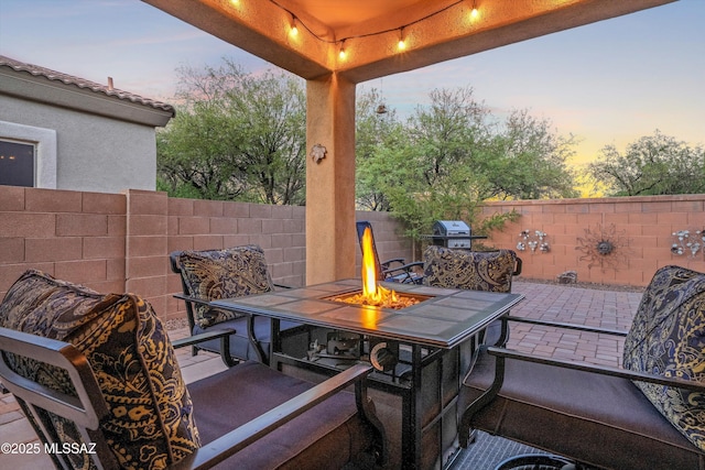 14511 S Camino Tierra Luna, Sahuarita, AZ 85629 - view of patio / terrace with an outdoor fire pit
