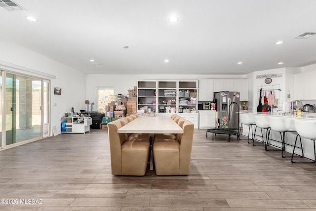 5568 W Summer Vw Dr, Marana, AZ 85658 - dining area with light wood-type flooring and recessed lighting