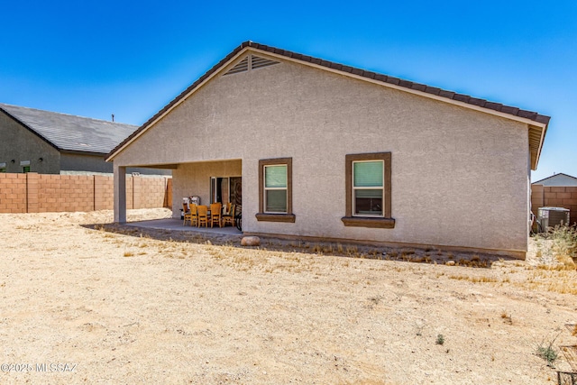 5568 W Summer Vw Dr, Marana, AZ 85658 - rear view of property with central AC unit, a patio, a fenced backyard, and stucco siding