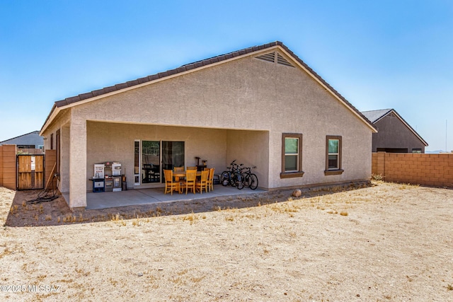 5568 W Summer Vw Dr, Marana, AZ 85658 - back of property featuring stucco siding and a patio area