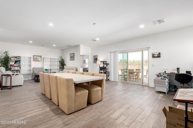 5568 W Summer Vw Dr, Marana, AZ 85658 - living area with light wood finished floors, recessed lighting, and a desk