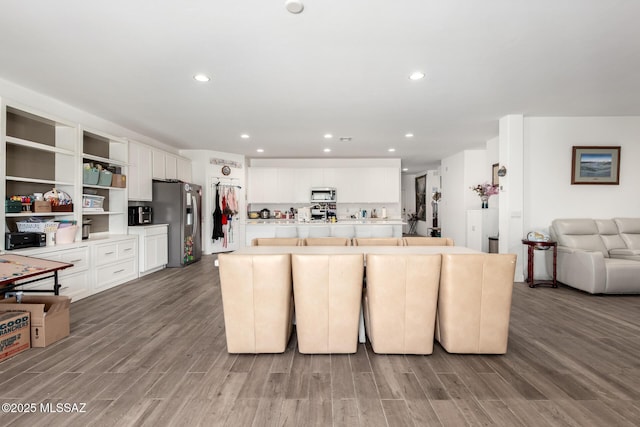 5568 W Summer Vw Dr, Marana, AZ 85658 - kitchen featuring stainless steel appliances, wood finished floors, open shelves, white cabinets, and recessed lighting