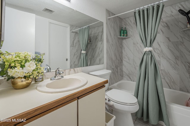 7913 E Colette Cir Unit 44, Tucson, AZ 85710 - full bath with shower / tub combo with curtain, toilet, vanity, a textured ceiling, and tile patterned flooring