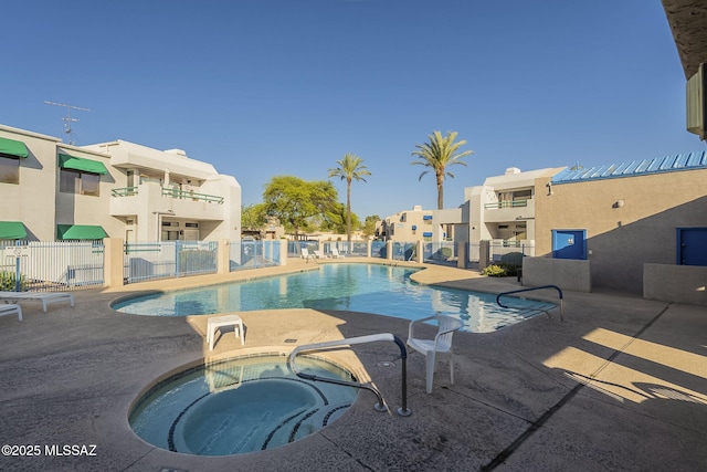 7913 E Colette Cir Unit 44, Tucson, AZ 85710 - community pool with a hot tub, a residential view, and a patio