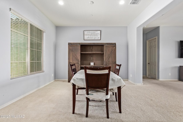 11874 N Raphael Way, Tucson, AZ 85742 - dining room featuring light carpet, baseboards, and recessed lighting