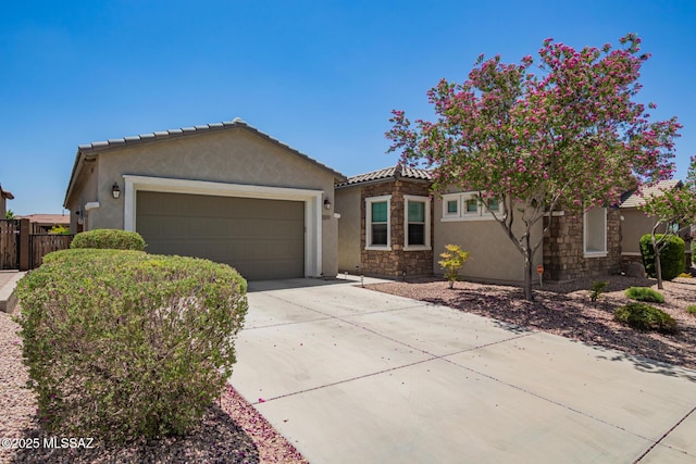 11874 N Raphael Way, Tucson, AZ 85742 - ranch-style home with stucco siding, stone siding, a garage, and concrete driveway