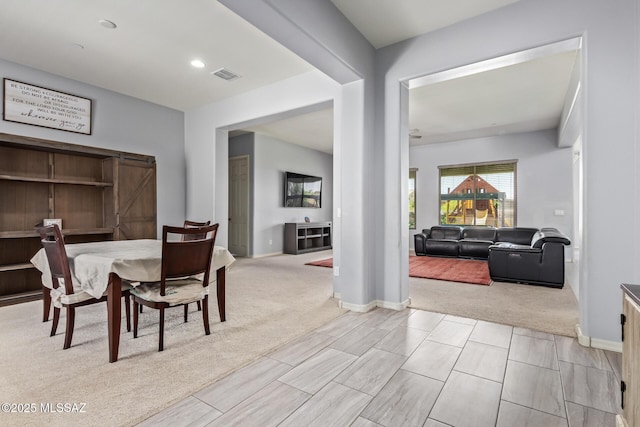 11874 N Raphael Way, Tucson, AZ 85742 - dining room featuring light carpet and baseboards