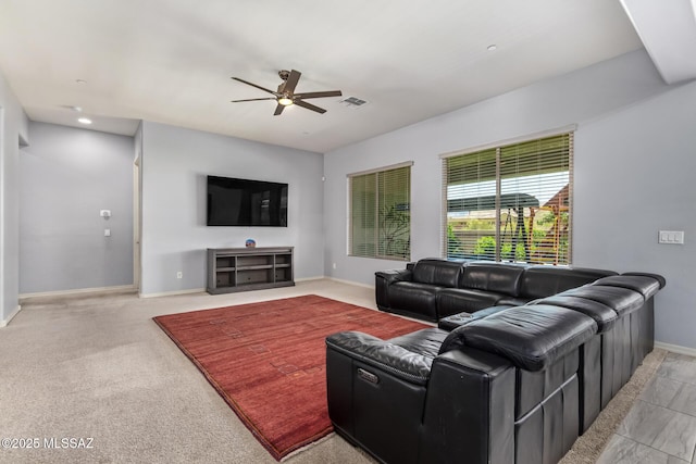 11874 N Raphael Way, Tucson, AZ 85742 - living room with ceiling fan, baseboards, and carpet