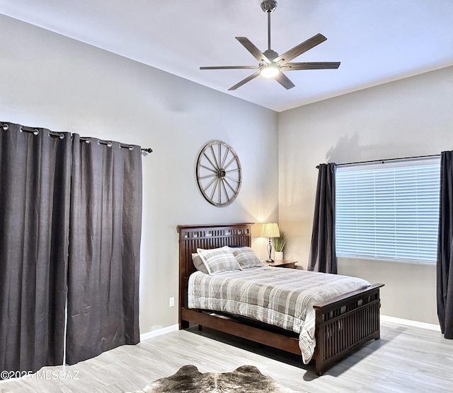 3335 E Canyoneer Pl, Vail, AZ 85641 - bedroom featuring wood finished floors, baseboards, vaulted ceiling, and ceiling fan
