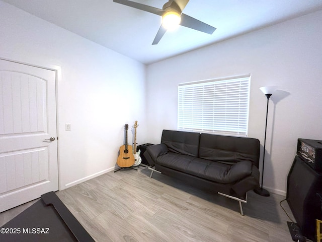 3335 E Canyoneer Pl, Vail, AZ 85641 - living room featuring wood finished floors, a ceiling fan, and baseboards