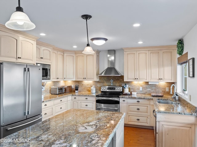 9880 E Cisco Ct, Tucson, AZ 85748 - kitchen with appliances with stainless steel finishes, wall chimney range hood, a sink, light stone countertops, and recessed lighting