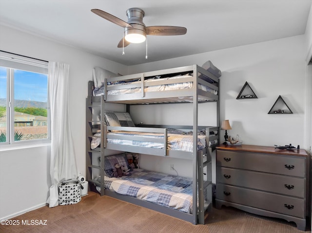 9880 E Cisco Ct, Tucson, AZ 85748 - carpeted bedroom with ceiling fan and baseboards