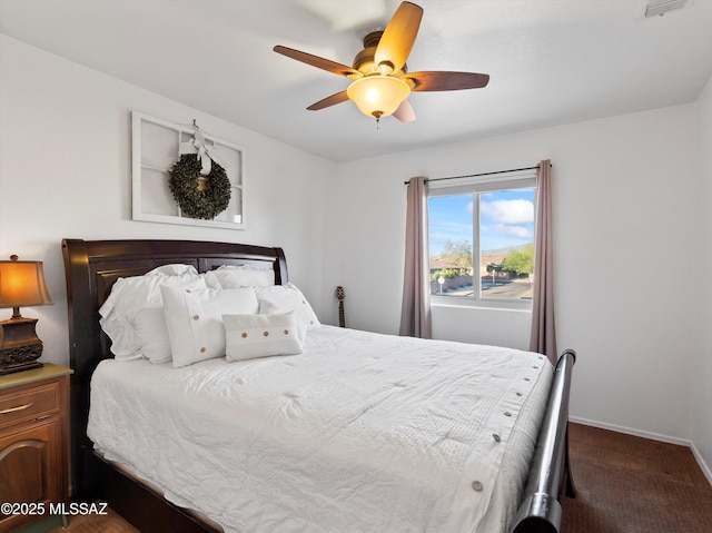 9880 E Cisco Ct, Tucson, AZ 85748 - bedroom featuring carpet flooring, a ceiling fan, and baseboards