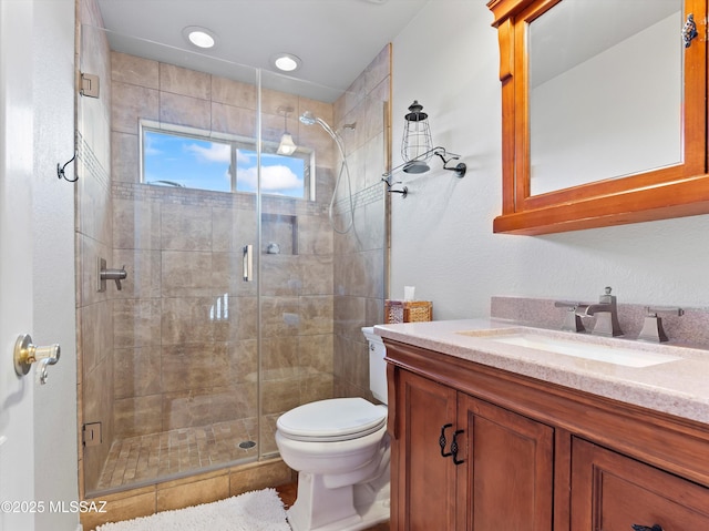 9880 E Cisco Ct, Tucson, AZ 85748 - bathroom with vanity, toilet, and a shower stall