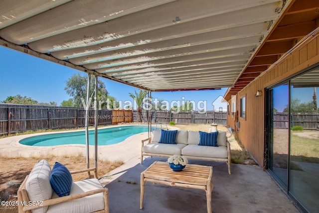 9552 E Irene St, Tucson, AZ 85730 - view of swimming pool featuring outdoor lounge area, a fenced backyard, and a patio